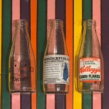 Load image into Gallery viewer, Vintage Milk Bottles
